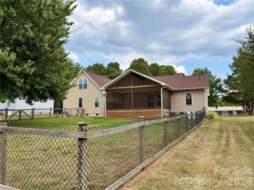 1027 Tabor Road, Olin, NC 28660.  MLS# CAR4399762, YatesRealty ID 35295. Fenced area