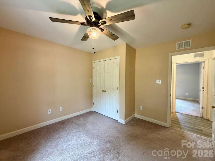 1027 Tabor Road, Olin, NC 28660.  MLS# CAR4399762, YatesRealty ID 35295. Front bedroom