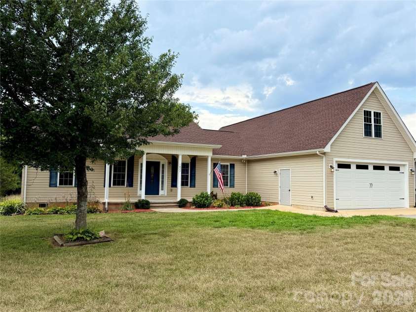 1027 Tabor Road, Olin, NC 28660.  MLS# CAR4399762, YatesRealty ID 35295. Front yard