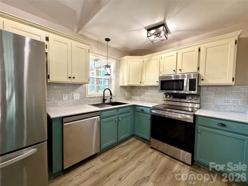 1027 Tabor Road, Olin, NC 28660.  MLS# CAR4399762, YatesRealty ID 35295. Kitchen
