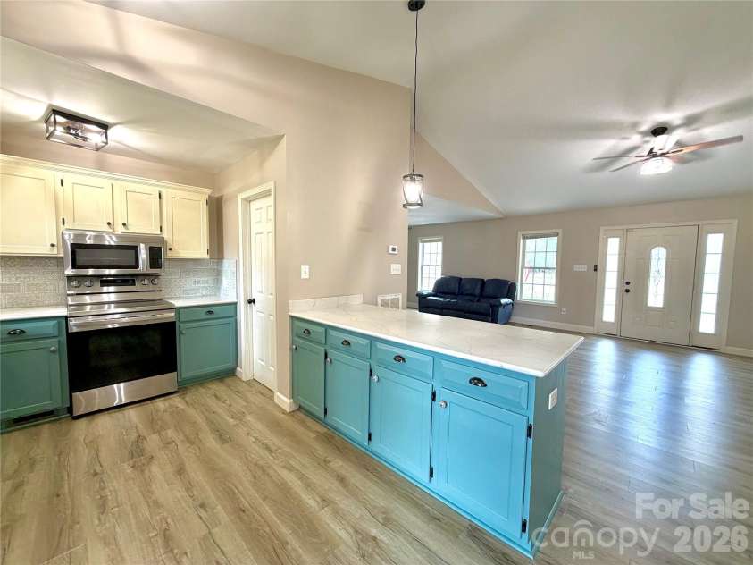 1027 Tabor Road, Olin, NC 28660.  MLS# CAR4399762, YatesRealty ID 35295. Kitchen bar