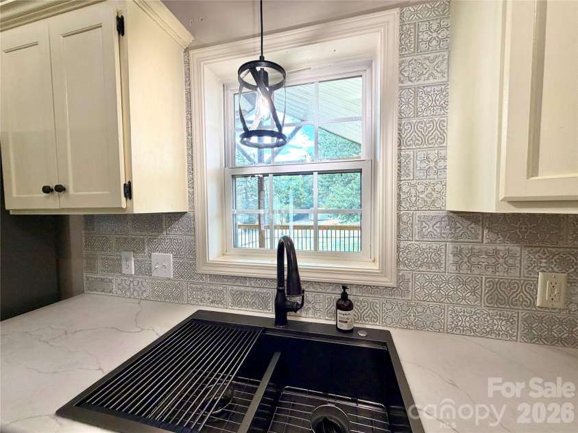 1027 Tabor Road, Olin, NC 28660.  MLS# CAR4399762, YatesRealty ID 35295. Kitchen sink