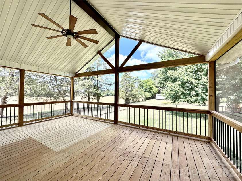 1027 Tabor Road, Olin, NC 28660.  MLS# CAR4399762, YatesRealty ID 35295. Large Screen porch