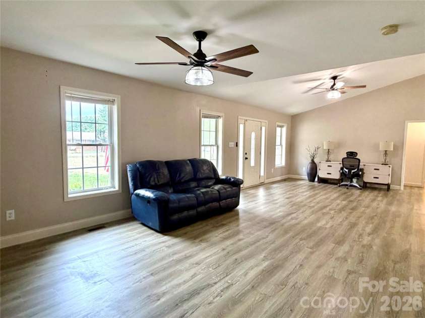 1027 Tabor Road, Olin, NC 28660.  MLS# CAR4399762, YatesRealty ID 35295. Living room