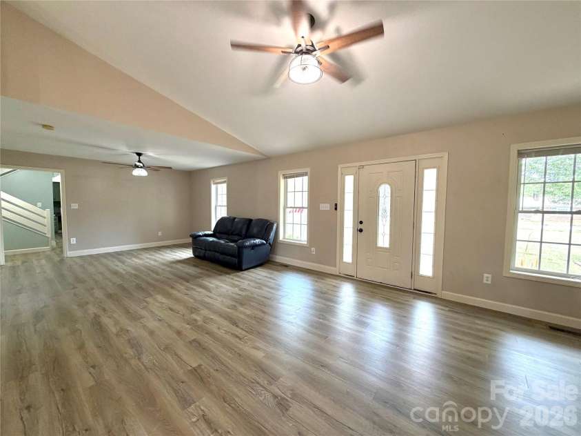 1027 Tabor Road, Olin, NC 28660.  MLS# CAR4399762, YatesRealty ID 35295. Living room