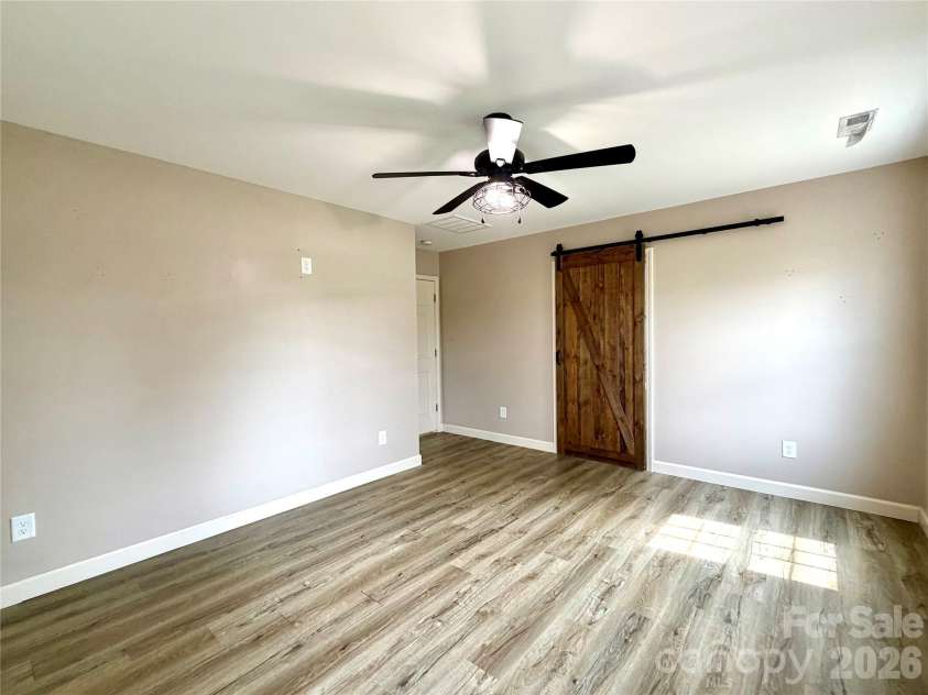 1027 Tabor Road, Olin, NC 28660.  MLS# CAR4399762, YatesRealty ID 35295. Primary bed