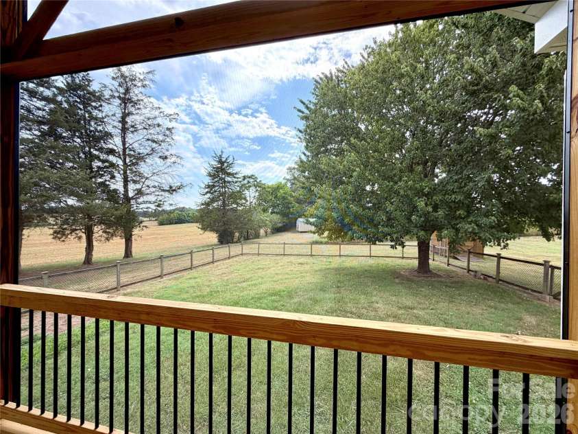 1027 Tabor Road, Olin, NC 28660.  MLS# CAR4399762, YatesRealty ID 35295. Screen porch