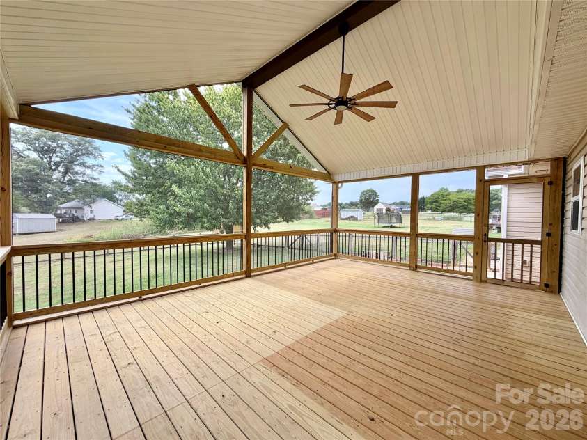 1027 Tabor Road, Olin, NC 28660.  MLS# CAR4399762, YatesRealty ID 35295. Screen porch