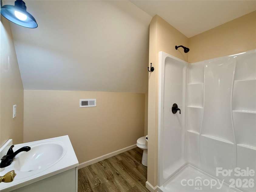 1027 Tabor Road, Olin, NC 28660.  MLS# CAR4399762, YatesRealty ID 35295. Upstairs bathroom