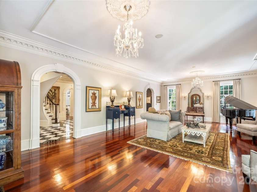 2665 Rolling Hills Drive, Monroe, NC 28110.  MLS# CAR4296531, YatesRealty ID 3530. Gathering room on the main level.