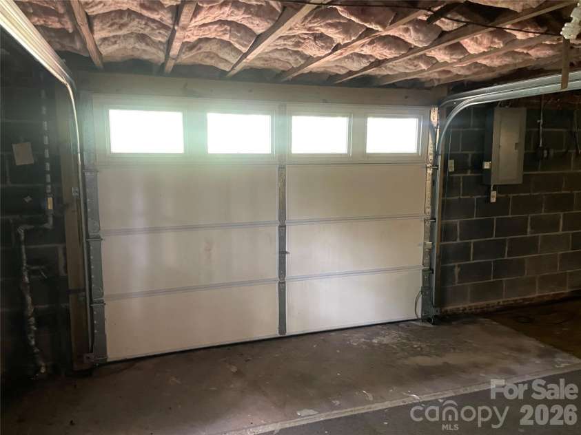1099 Amherst Road, Morganton, NC 28655.  MLS# CAR4400099, YatesRealty ID 35301. Garage door in basement