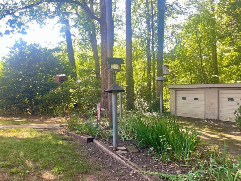 1099 Amherst Road, Morganton, NC 28655.  MLS# CAR4400099, YatesRealty ID 35301. Natural areas in back yard