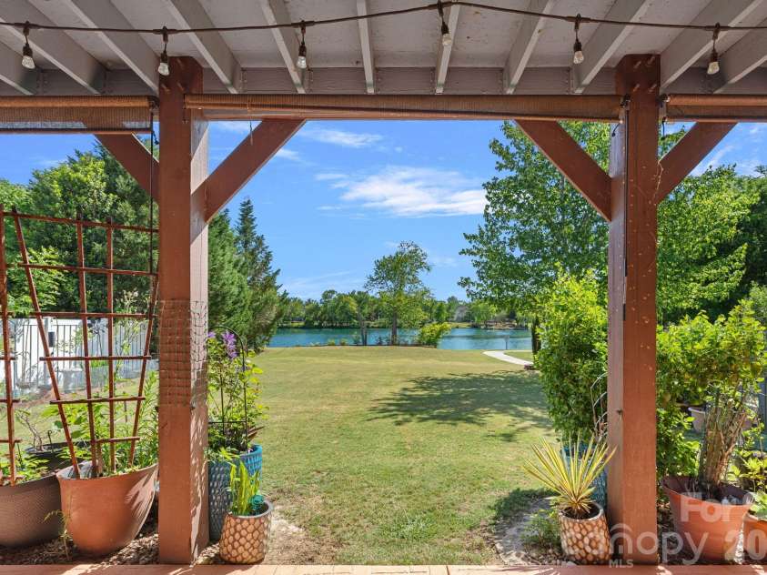 8220 Ruby Valley Road, Charlotte, NC 28277.  MLS# CAR4373964, YatesRealty ID 35304. Covered Patio/Pond view