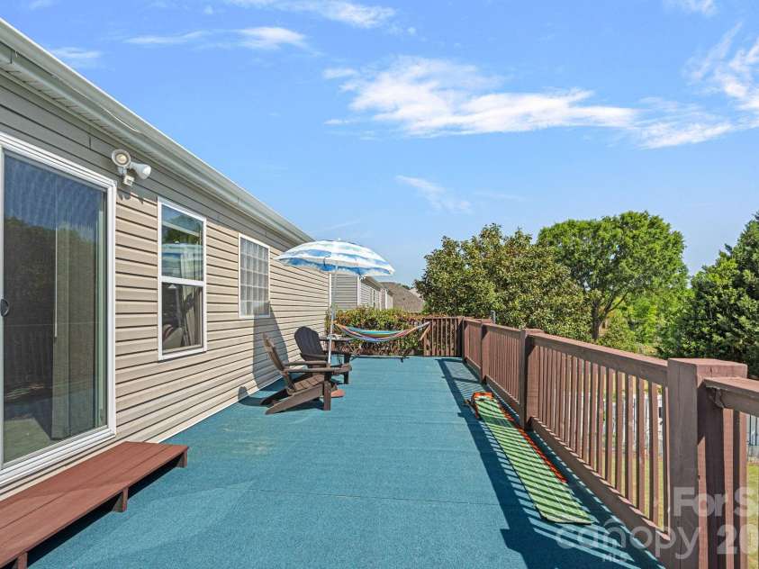 8220 Ruby Valley Road, Charlotte, NC 28277.  MLS# CAR4373964, YatesRealty ID 35304. Primary Bedroom Balcony/Wood Decking