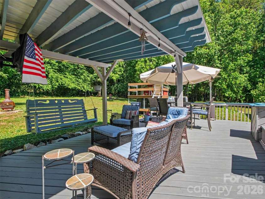 915 Ostwalt Amity Road, Statesville, NC 28677.  MLS# CAR4399624, YatesRealty ID 35306. Covered patio/ deck