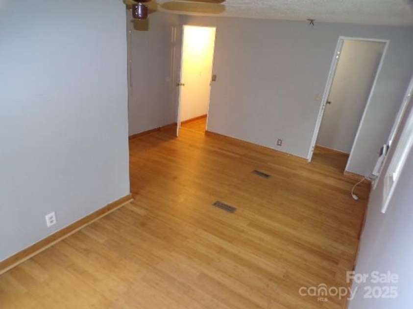 71 Flat Creek Road, Waynesville, NC 28785.  MLS# CAR4289223, YatesRealty ID 35307. Primary bedroom