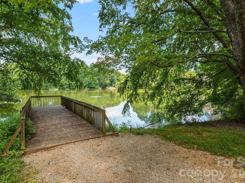 60 Barnrock Drive, Mills River, NC 28759.  MLS# CAR4399294, YatesRealty ID 35309. Community Fishing Dock