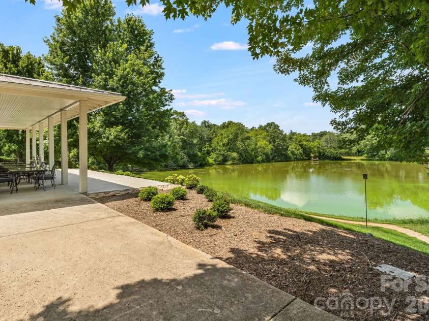 60 Barnrock Drive, Mills River, NC 28759.  MLS# CAR4399294, YatesRealty ID 35309. Pond View from the Clubhouse