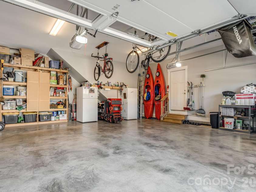 60 Barnrock Drive, Mills River, NC 28759.  MLS# CAR4399294, YatesRealty ID 35309. Two-Car Garage with Exceptional Storage Space
