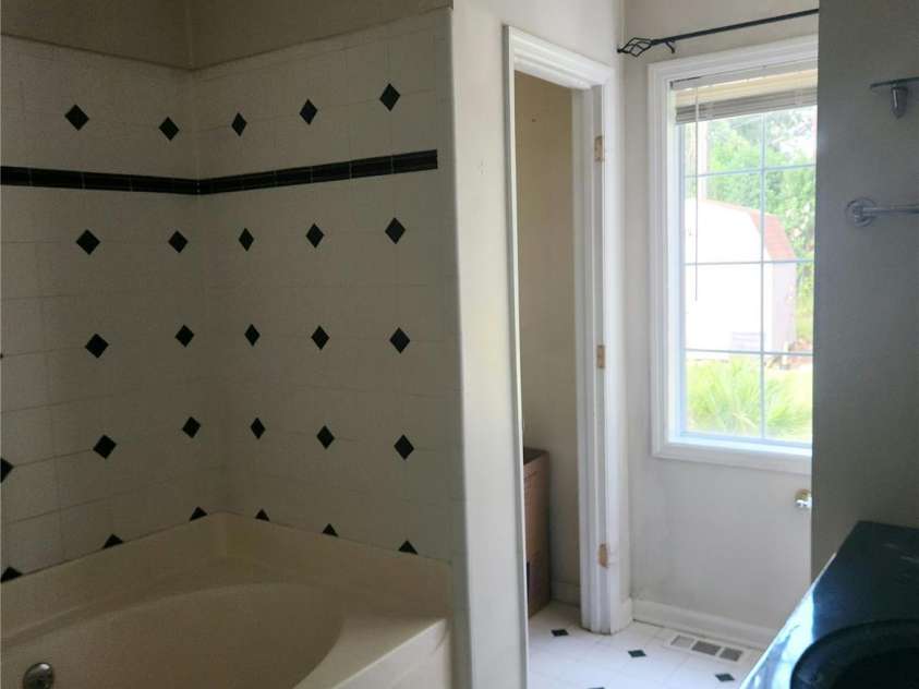 3104 Yvonne Lane, Charlotte, NC 28216.  MLS# CAR4285006, YatesRealty ID 35310. Primary ensuite bath