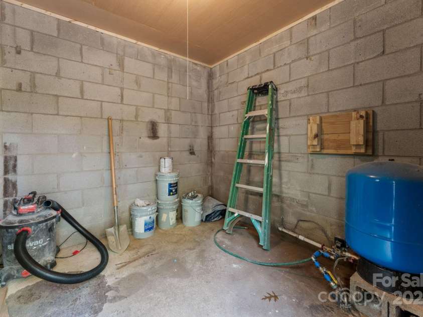 164 Pigeon Lane, Sylva, NC 28779.  MLS# CAR4295317, YatesRealty ID 35317. Out Building with new Pressure Tank