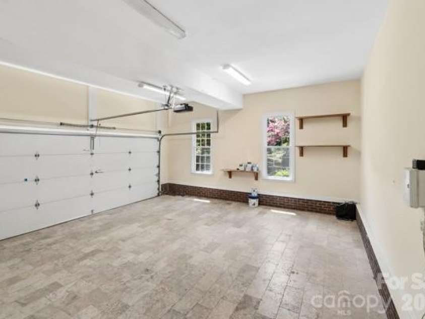 2328 Howerton Court, Charlotte, NC 28270.  MLS# CAR4388692, YatesRealty ID 35327. Garage with tiled floor