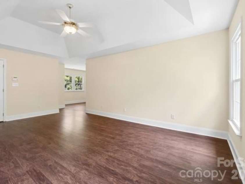 2328 Howerton Court, Charlotte, NC 28270.  MLS# CAR4388692, YatesRealty ID 35327. Primary Bedroom with trey ceiling and view into sitting room