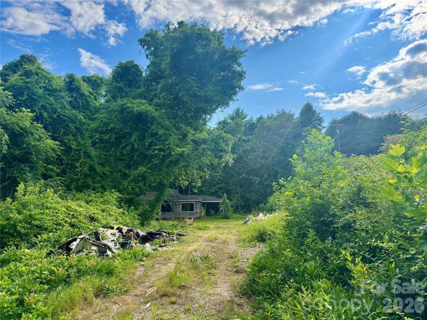 2874 Huffman Road, Lenoir, NC 28645.  MLS# CAR4400309, YatesRealty ID 35328. Debris from old camper that was destroyed in Helene