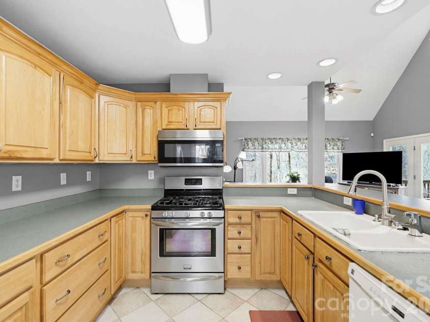 13705 Rosman Highway, Lake Toxaway, NC 28747.  MLS# CAR4335401, YatesRealty ID 35329. Open kitchen area
