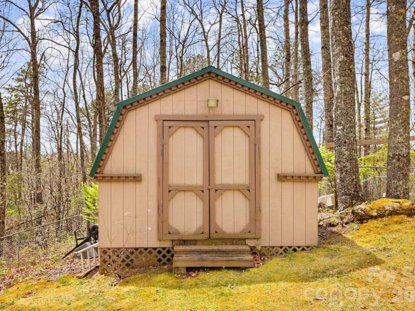13705 Rosman Highway, Lake Toxaway, NC 28747.  MLS# CAR4335401, YatesRealty ID 35329. Storage shed