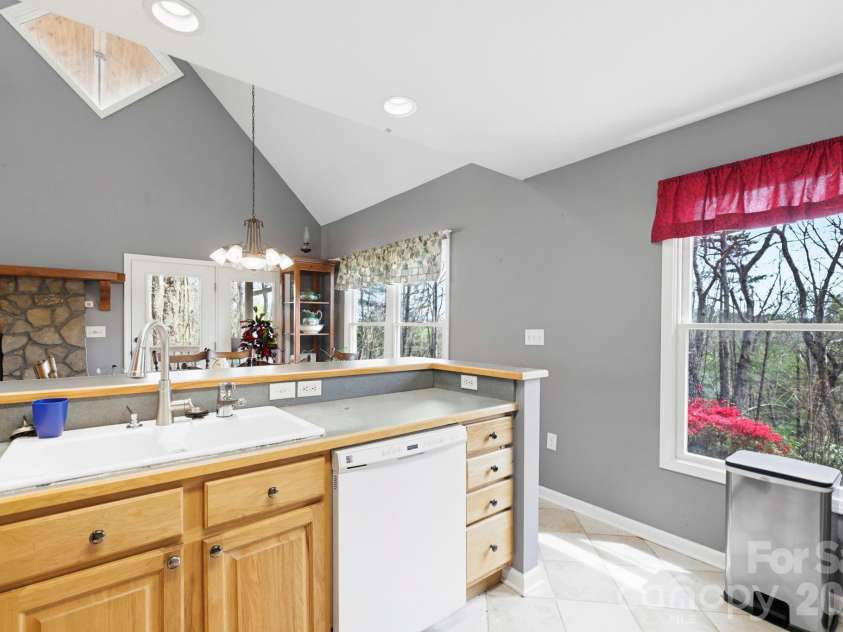 13705 Rosman Highway, Lake Toxaway, NC 28747.  MLS# CAR4335401, YatesRealty ID 35329. Views from the kitchen area