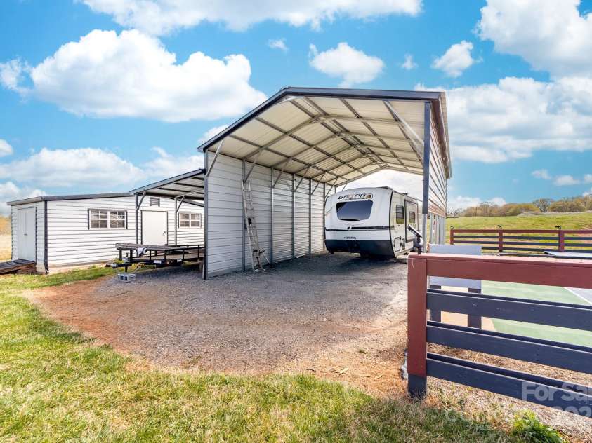 825 Ed Hamrick Road, Shelby, NC 28150.  MLS# CAR4239621, YatesRealty ID 3533. RV carport and storage building to remain.