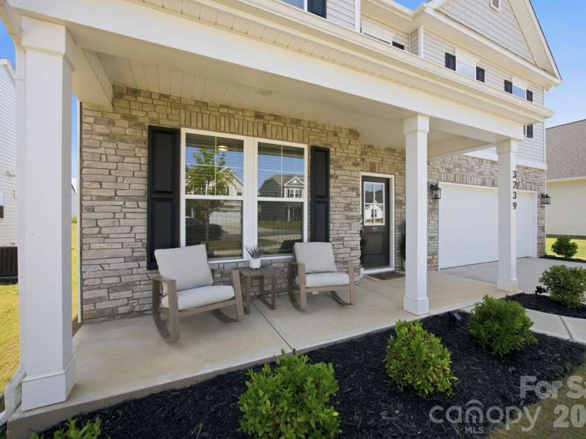 3239 Laurel Brook Drive, Denver, NC 28037.  MLS# CAR4396300, YatesRealty ID 35335. Charming covered front porch