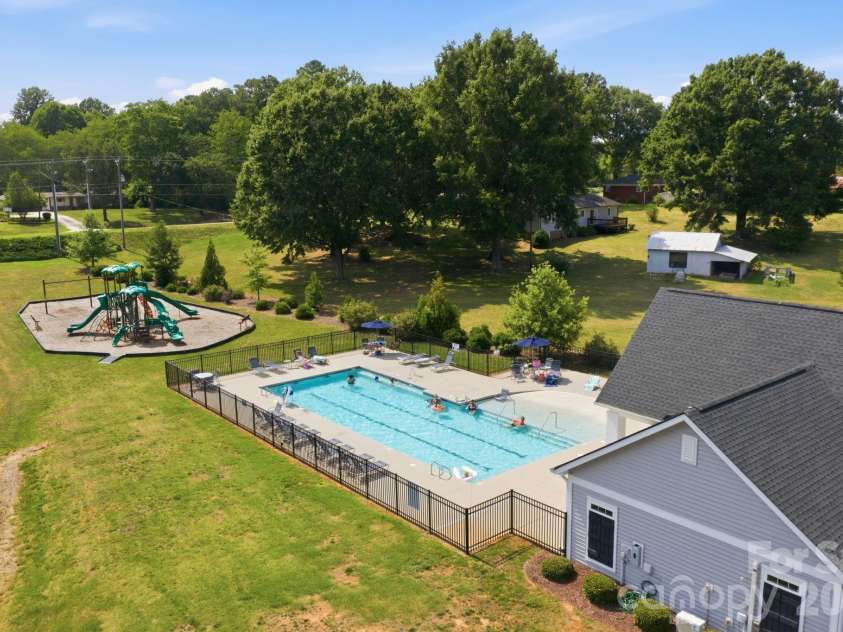 3239 Laurel Brook Drive, Denver, NC 28037.  MLS# CAR4396300, YatesRealty ID 35335. Community pool, playground, and cabana