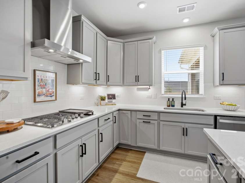 3239 Laurel Brook Drive, Denver, NC 28037.  MLS# CAR4396300, YatesRealty ID 35335. Gas cooktop and hood range