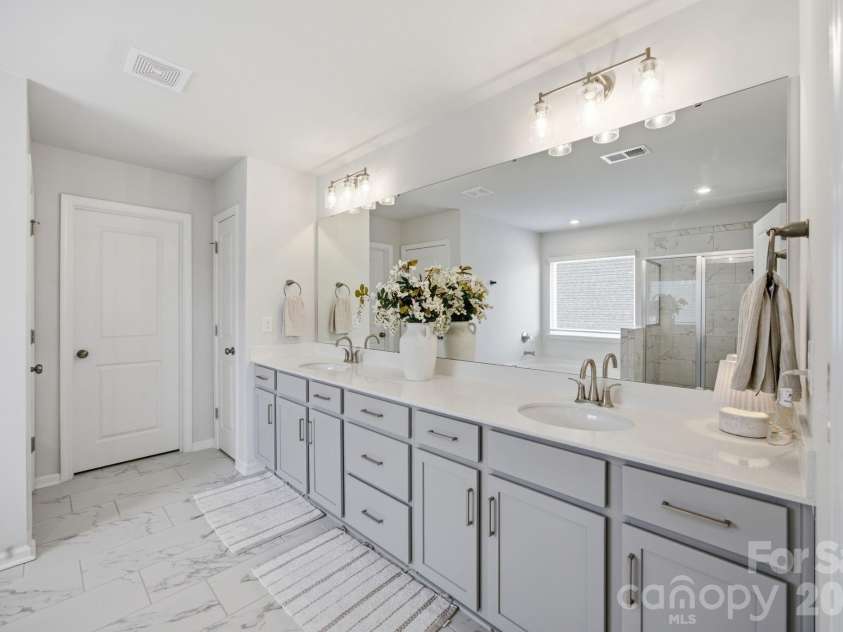3239 Laurel Brook Drive, Denver, NC 28037.  MLS# CAR4396300, YatesRealty ID 35335. Luxurious primary bath