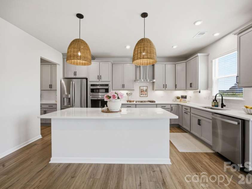 3239 Laurel Brook Drive, Denver, NC 28037.  MLS# CAR4396300, YatesRealty ID 35335. Oversized quartz island