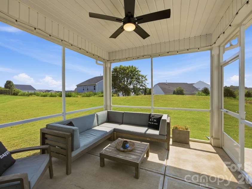 3239 Laurel Brook Drive, Denver, NC 28037.  MLS# CAR4396300, YatesRealty ID 35335. Screened covered patio