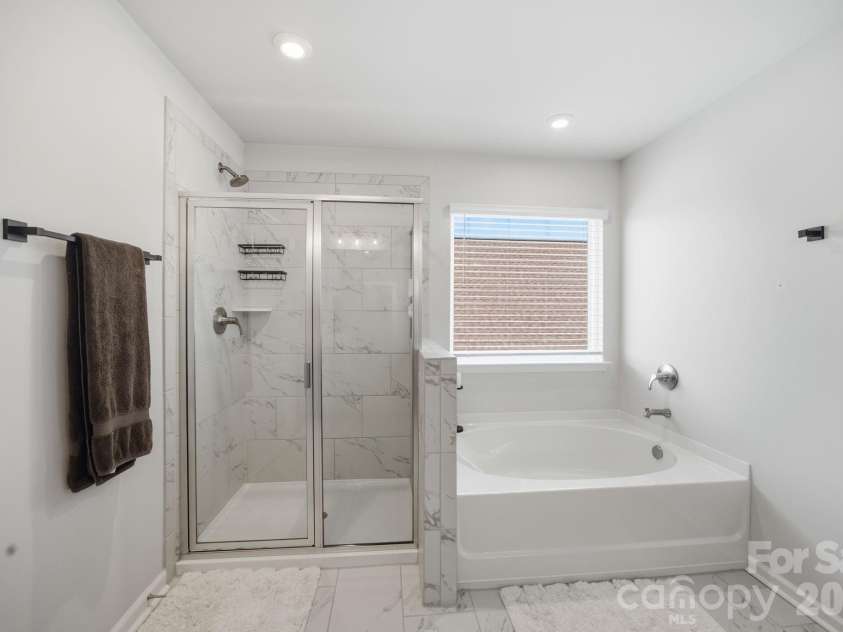 3239 Laurel Brook Drive, Denver, NC 28037.  MLS# CAR4396300, YatesRealty ID 35335. Separate soaking tub and walk-in shower