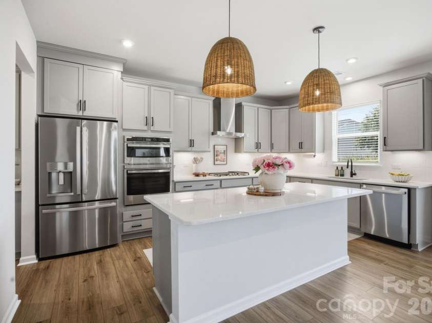 3239 Laurel Brook Drive, Denver, NC 28037.  MLS# CAR4396300, YatesRealty ID 35335. Upgraded kitchen finishes with under cabinet lighting