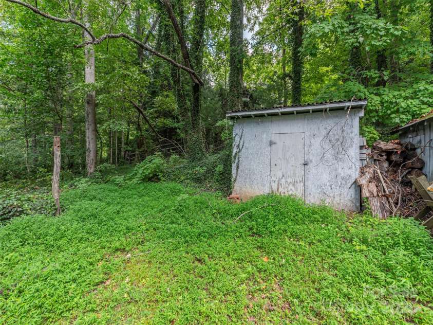 10 Beaverdam Knoll Road, Asheville, NC 28804.  MLS# CAR4297568, YatesRealty ID 35336. Another storage building for firewood