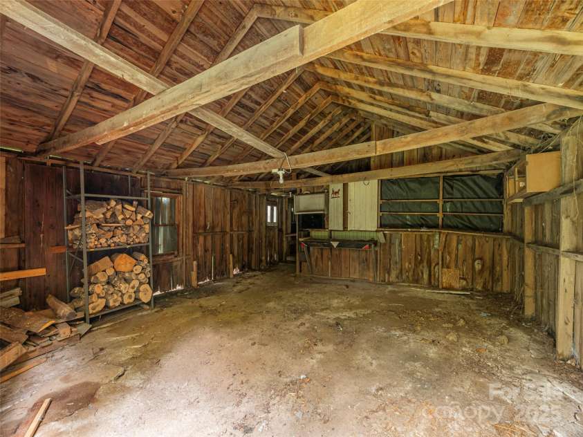 10 Beaverdam Knoll Road, Asheville, NC 28804.  MLS# CAR4297568, YatesRealty ID 35336. Inside the Barn/garage