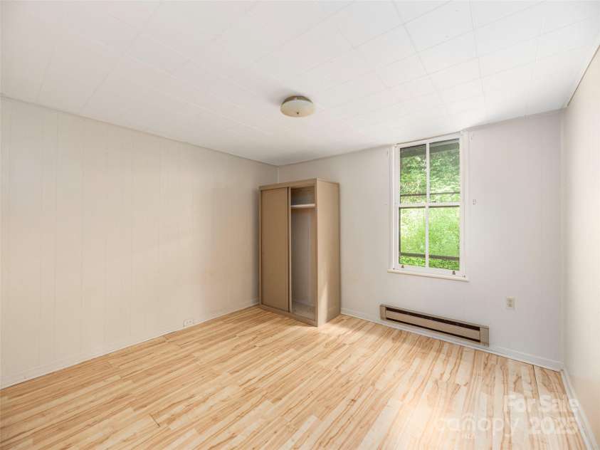10 Beaverdam Knoll Road, Asheville, NC 28804.  MLS# CAR4297568, YatesRealty ID 35336. Wardrobe used as closet