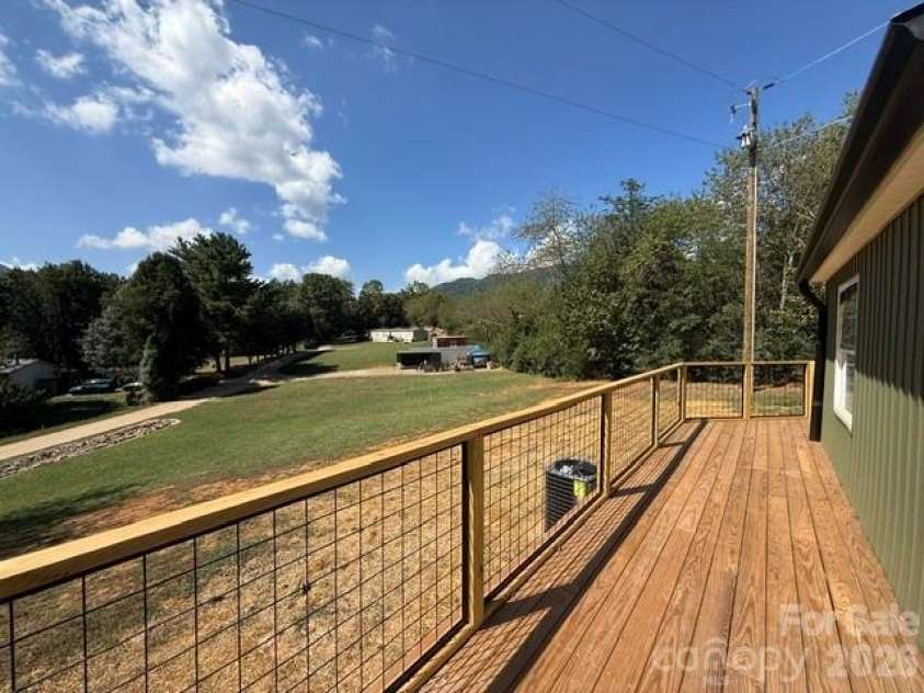 25 Jason Case Drive, Candler, NC 28715.  MLS# CAR4389412, YatesRealty ID 35341. Front Porch View