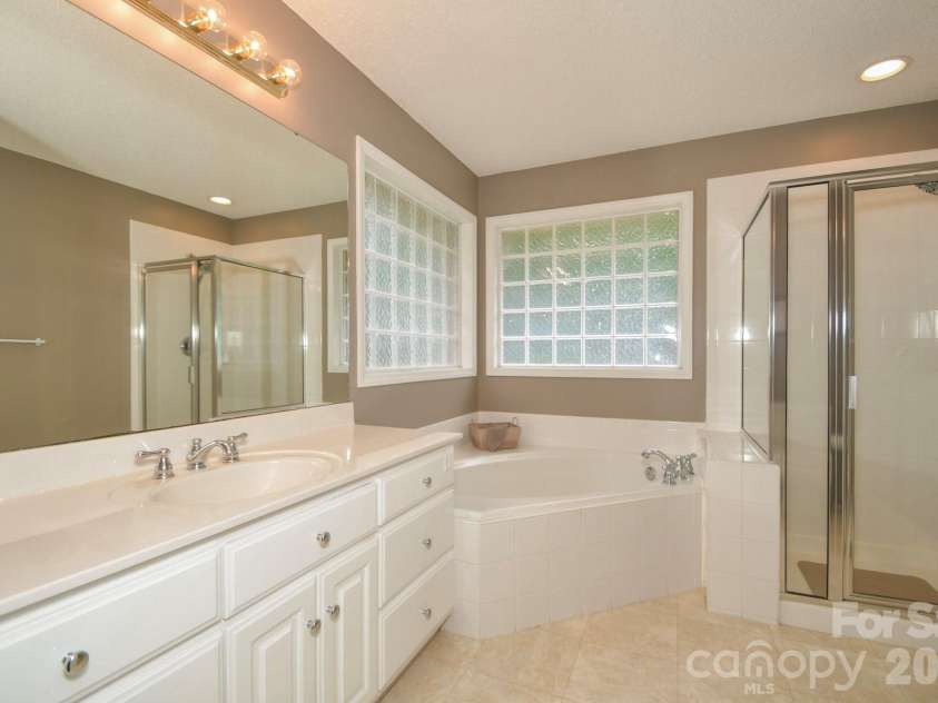 5409 Love Mill Road, Monroe, NC 28110.  MLS# CAR4283884, YatesRealty ID 35343. Master Bathroom