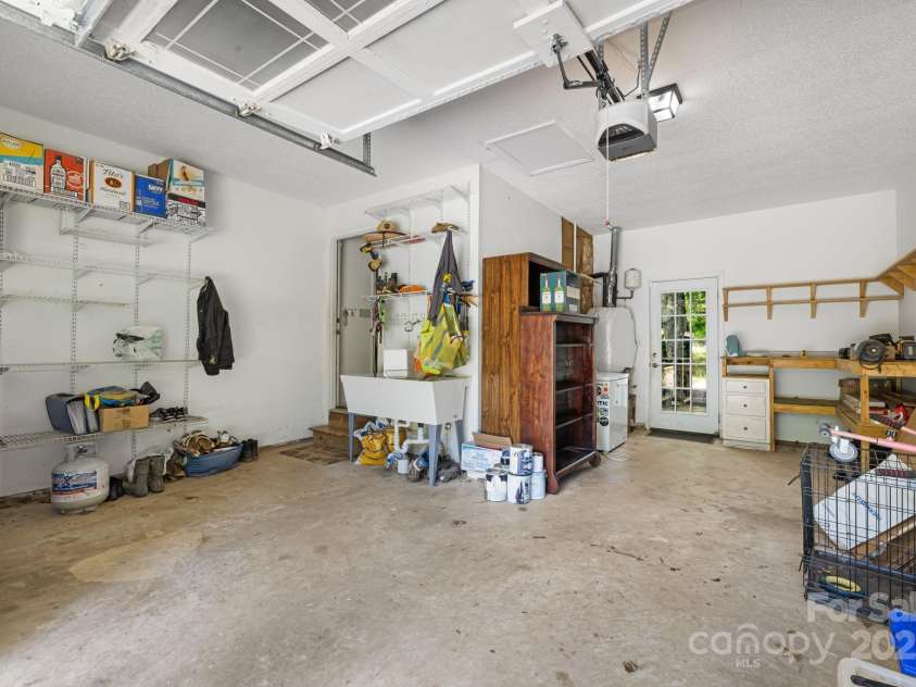 3 Trappers Run Drive, Asheville, NC 28805.  MLS# CAR4286329, YatesRealty ID 35345. One car garage with lots of storage