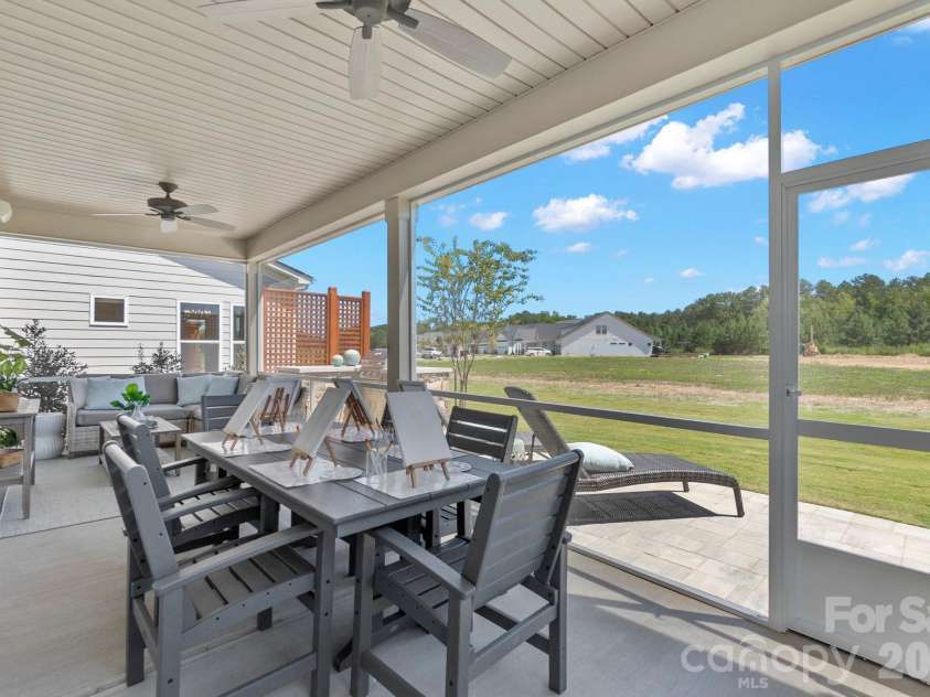 208 Northgate Boulevard, Indian Trail, NC 28079.  MLS# CAR4362214, YatesRealty ID 35346. Screened in porch