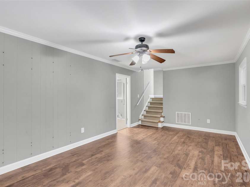 1825 Winfield Drive, Monroe, NC 28110.  MLS# CAR4364944, YatesRealty ID 35348. Down stairs Den/second Living Room