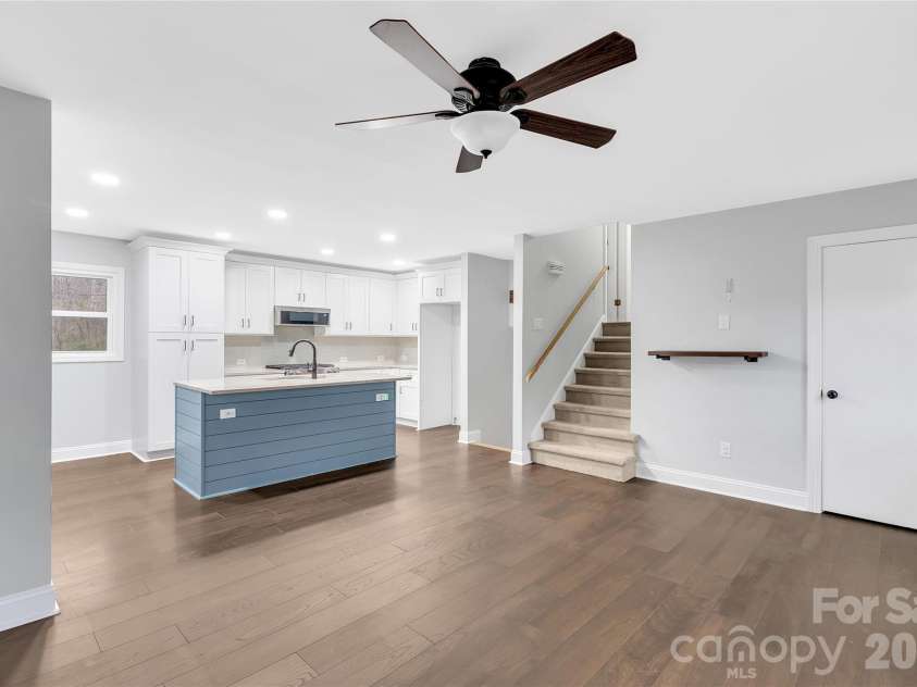 1825 Winfield Drive, Monroe, NC 28110.  MLS# CAR4364944, YatesRealty ID 35348. Main level kitchen & living room