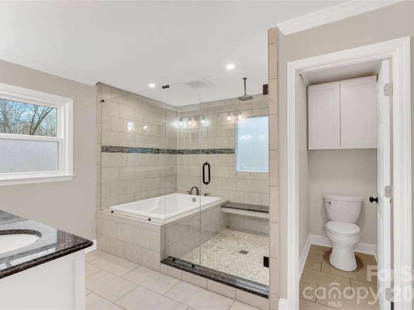 1825 Winfield Drive, Monroe, NC 28110.  MLS# CAR4364944, YatesRealty ID 35348. Primary Bath with tub enclosed shower